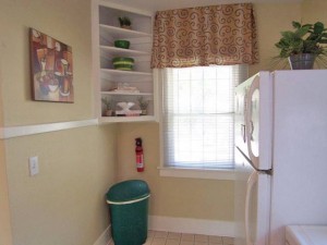 KitchenAfter2 Paint, drapes and accessories make this kitchen feel more inviting