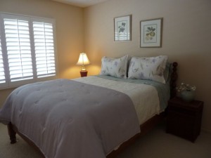Bedroom After - Beige Walls Color adds warmth and contrast