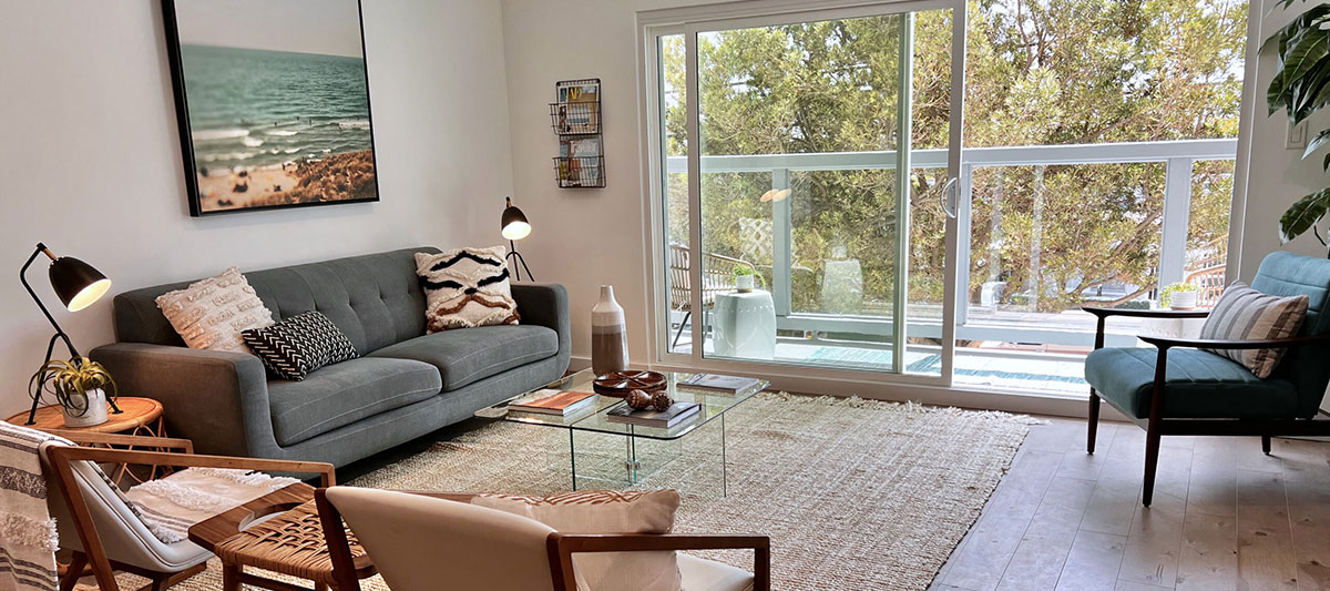 Staged living room with sliding glass door in Southern California.
